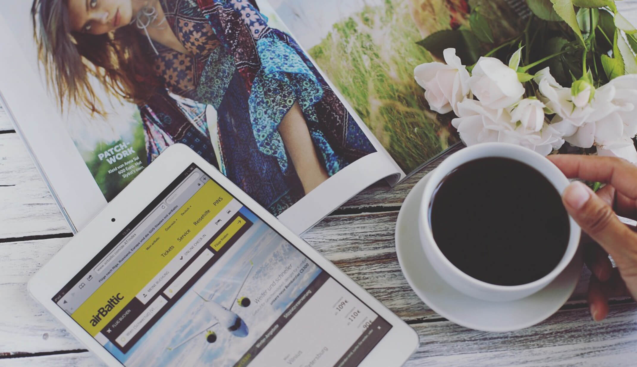 reading magazine fashion coffee passport flowers flat-lay hand fresh white branded app application travel ready planning travel real social UGC photography