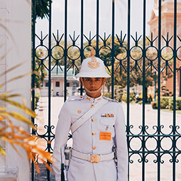 man guard asia white gold uniform gate entrance palace real UGC travel content photography
