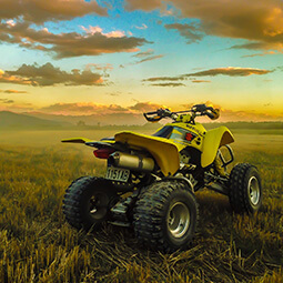 field bike quad sport landscape clouds yellow grass view man fun adrenaline real UG travel content photography